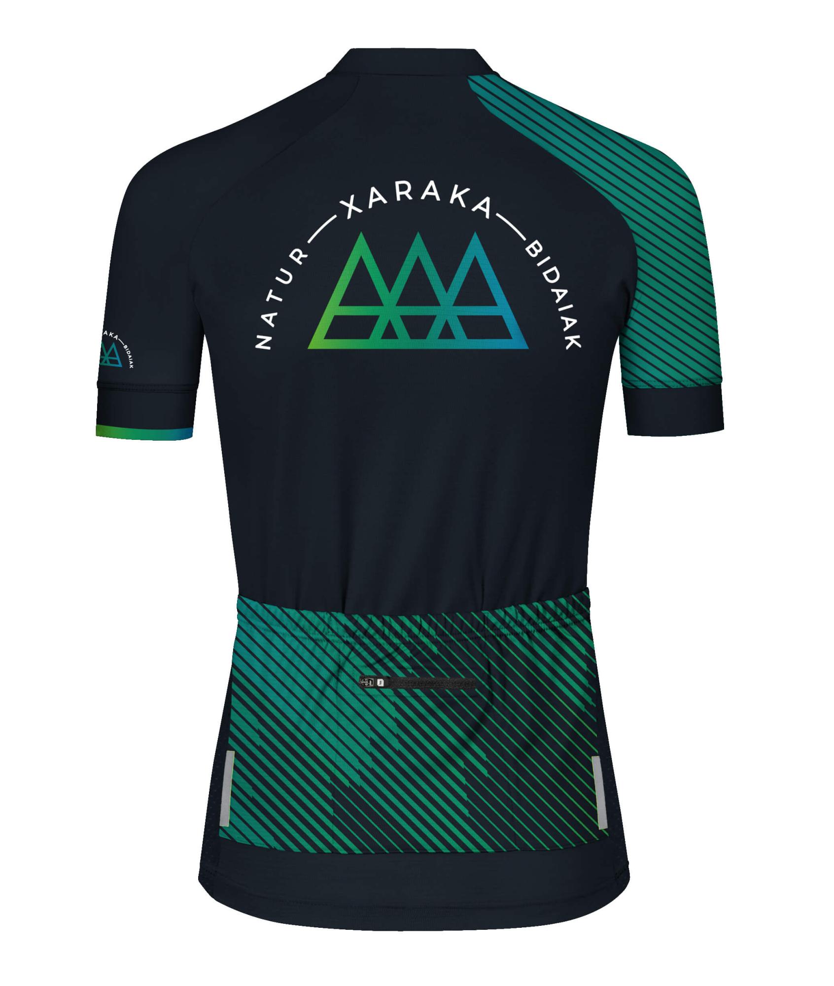 Maillot femenino para ciclismo de montaña, con rejillas microperforadas y tiras reflectantes. Diseño regular fit para libertad de movimiento, con bolsillos y opción de personalización.